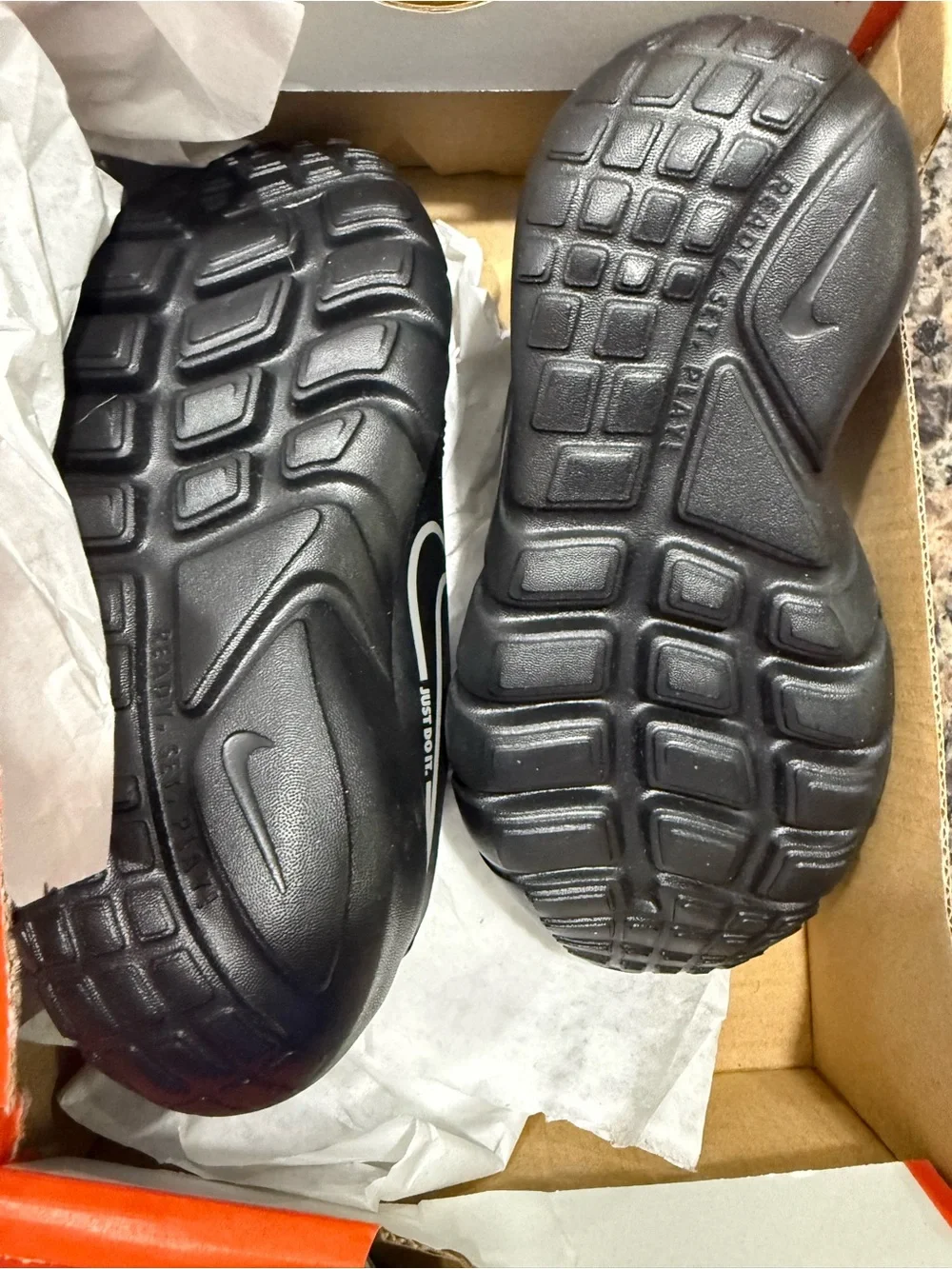 Nike Black Kids' Slip-On Sneakers with Silver Swoosh